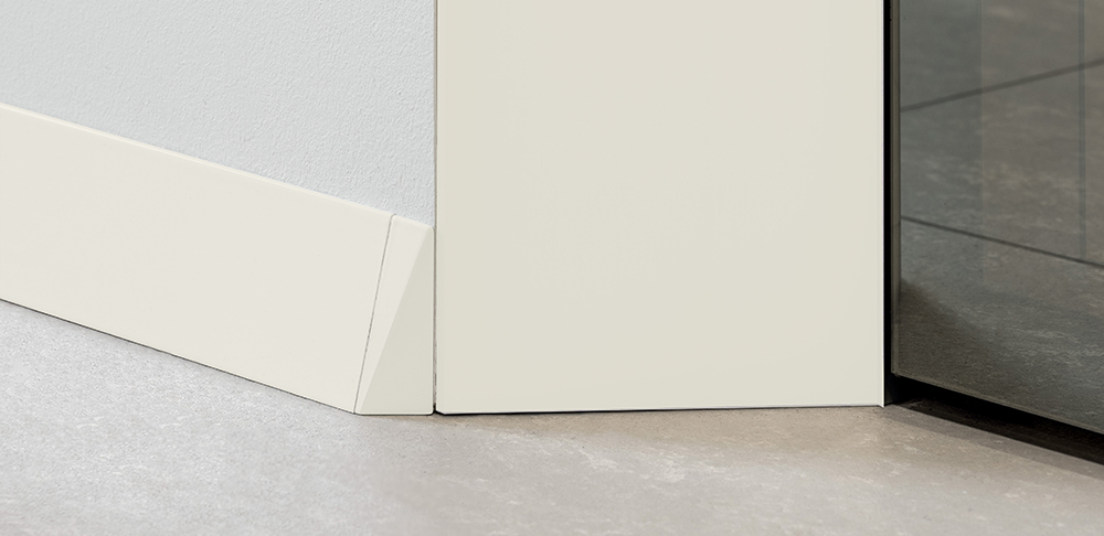 White inclined skirting board