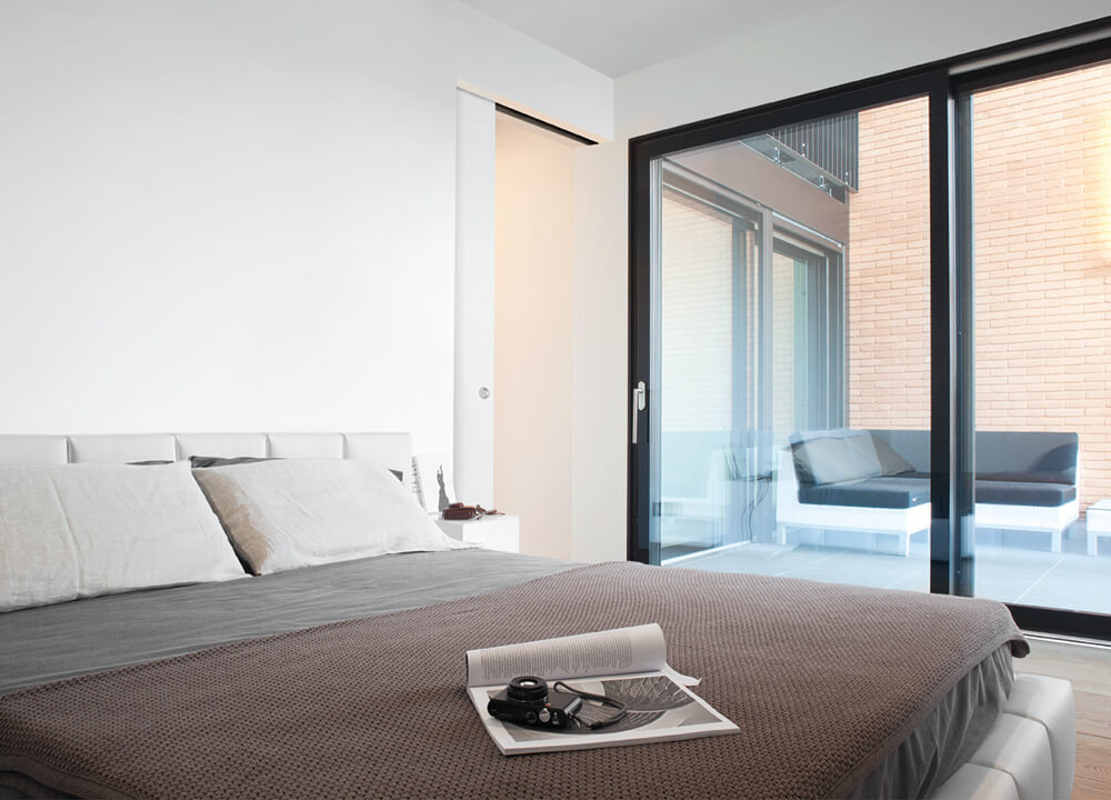 ECLISSE trim-less sliding pocket door system