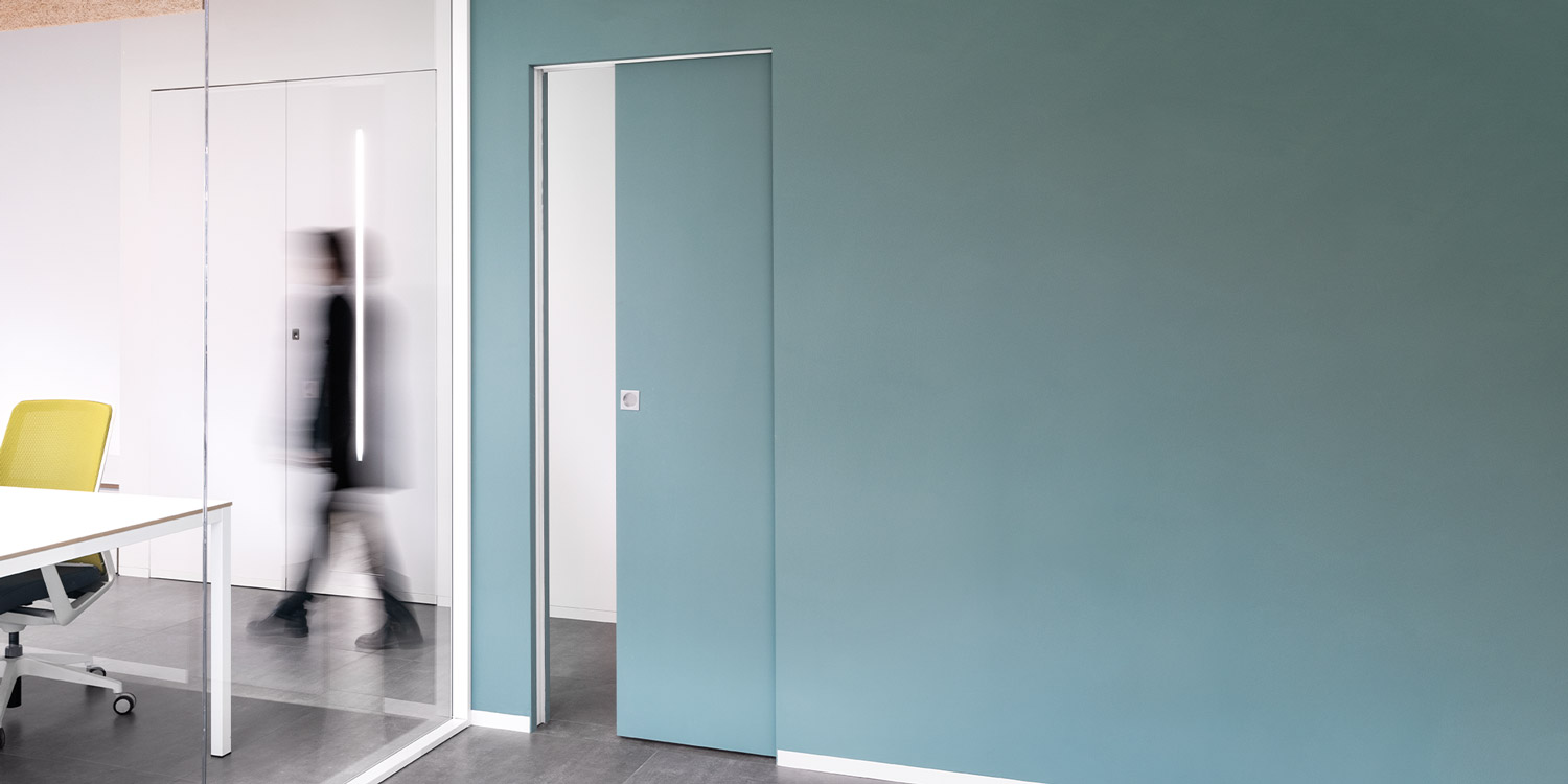 Flush sliding pocket door