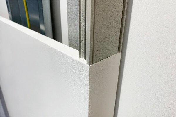 Resin-coated profiles for pocket door systems